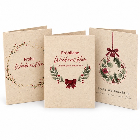 3er-Set Weihnachtskarten aus Graspapier mit drei Aquarellmotiven auf weißem Hintergrund